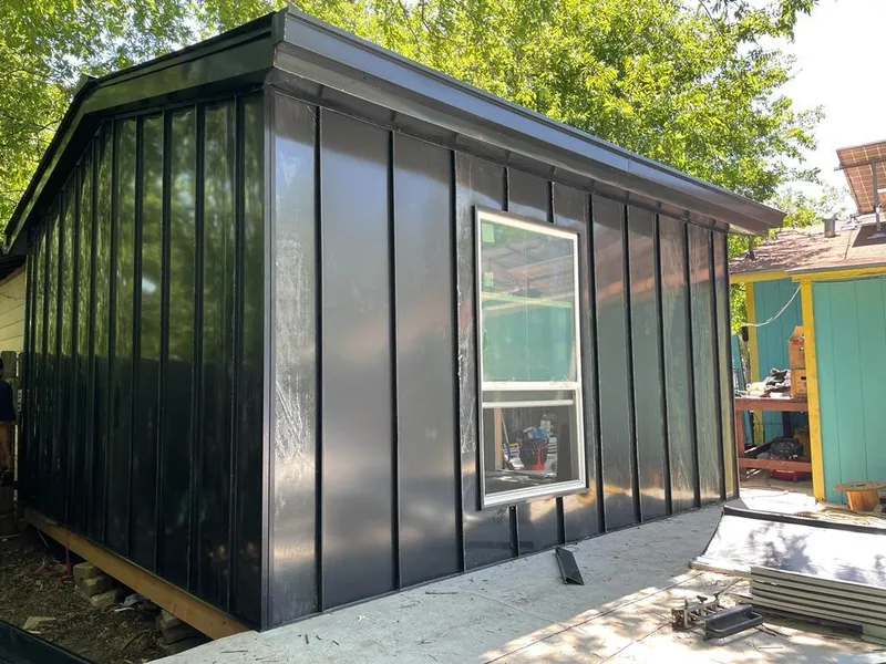 Black standing seam metal wall panels for Roof Inspection in Summerville